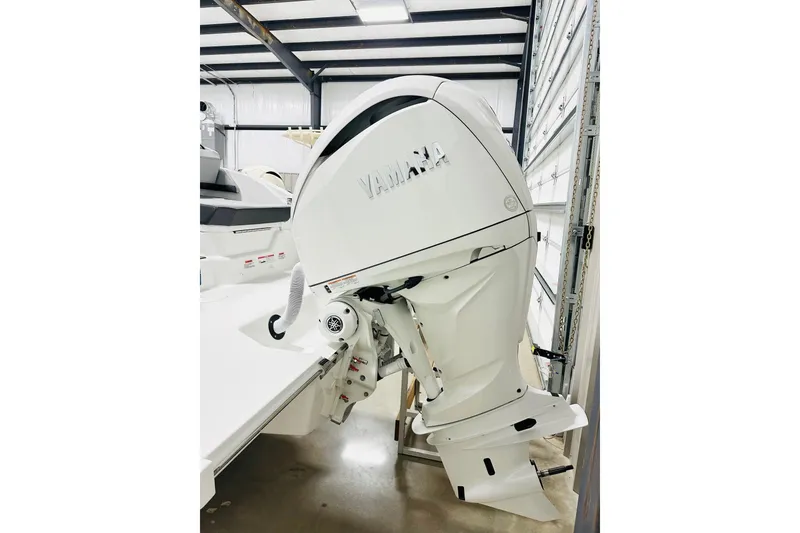 Slide: The Image of 2026 Cobalt R6 Outboard with Yamaha engine in a garage setting. - 15