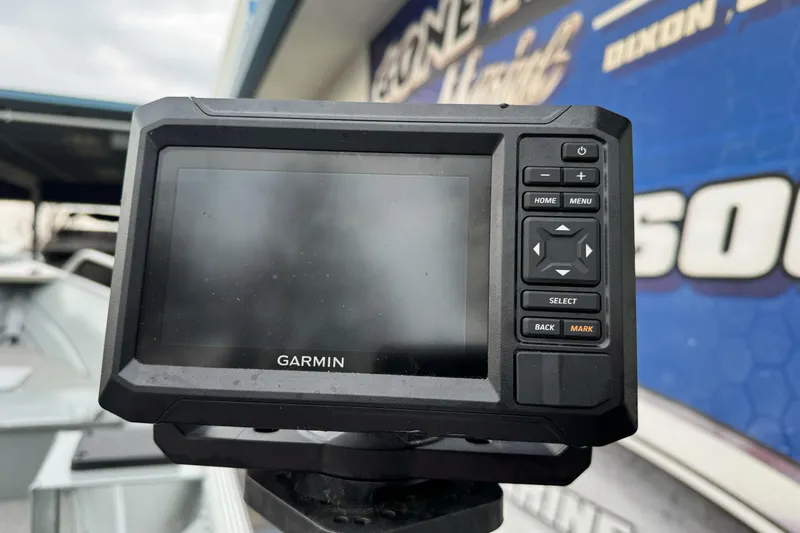 Slide: The Image of Garmin device on 2023 Klamath 14 Deluxe boat, outdoor setting. - 9