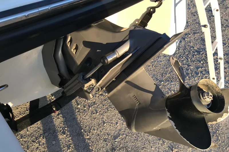 Slide: The Image of 2001 Four Winns 200 Horizon boat propeller and outdrive detail. - 19