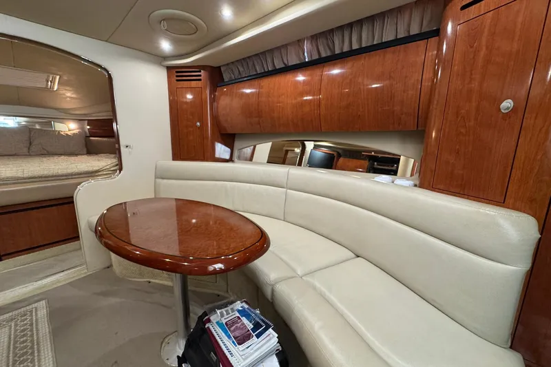 Slide: The Image of Luxurious interior of 2005 Sea Ray 360 Sundancer yacht with elegant wood finishes. - 13