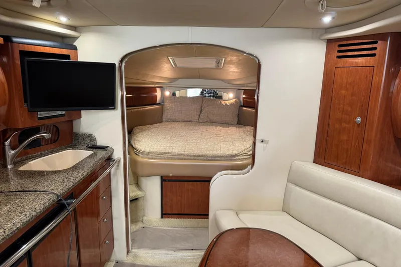 Slide: The Image of Luxurious interior of a 2005 Sea Ray 360 Sundancer yacht with cozy cabin and modern amenities. - 14