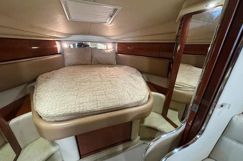 Slide: The Image of Luxurious cabin interior of 2005 Sea Ray 360 Sundancer yacht with cozy bed. - 15