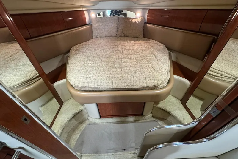 Slide: The Image of Luxurious cabin interior of 2005 Sea Ray 360 Sundancer yacht with cozy bed. - 17