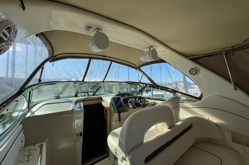 Slide: The Image of Interior of 2005 Sea Ray 360 Sundancer yacht with helm and seating area. - 4