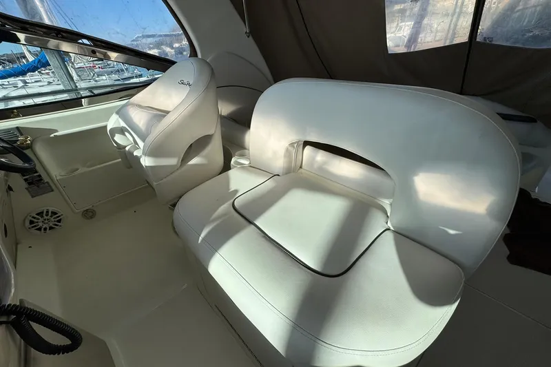 Slide: The Image of Interior of 2005 Sea Ray 360 Sundancer with white leather seating. - 5