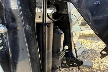 Slide: The Image of Close-up of a 2018 Boston Whaler 170 Super Sport boat engine component. - 20