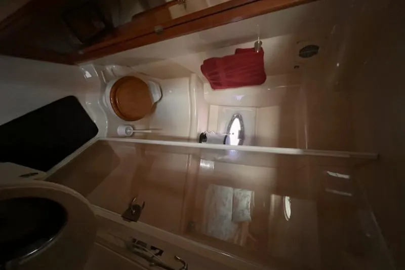 Slide: The Image of Bathroom interior of 2004 Meridian 459 Motoryacht with shower and porthole. - 14