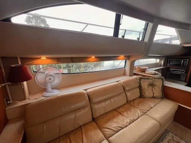 Slide: The Image of Luxurious interior of 2004 Meridian 459 Motoryacht with leather seating and modern amenities. - 15