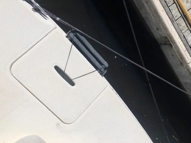 Slide: The Image of Close-up of 2004 Meridian 459 Motoryacht deck with mooring lines. - 23