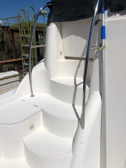 Slide: The Image of Staircase on 2004 Meridian 459 Motoryacht with stainless steel railings. - 28