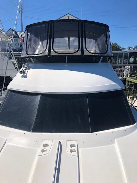 Slide: The Image of 2004 Meridian 459 Motoryacht with sleek design and spacious upper deck. - 34