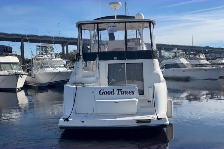 Slide: The Image of Rear view of 2004 Meridian 459 Motoryacht in harbor. - 4