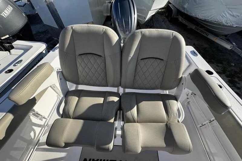 Slide: The Image of 2026 Sportsman Open 212 Center Console boat seats, featuring comfortable, cushioned design. - 17