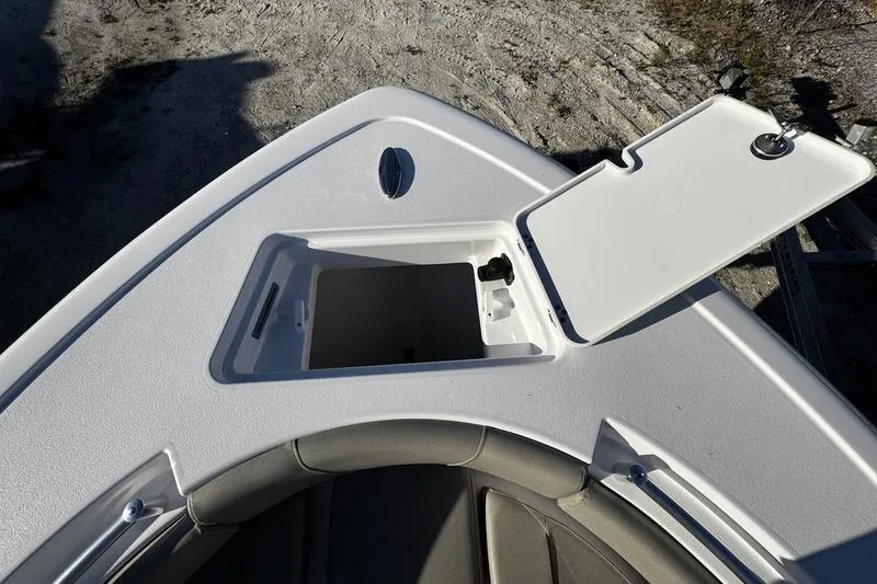 Slide: The Image of 2026 Sportsman Open 212 Center Console boat with open storage compartment. - 5