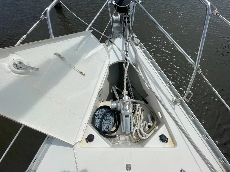 Slide: The Image of Bow of 1998 Jeanneau Sun Odyssey 45.2 with anchor locker open. - 10