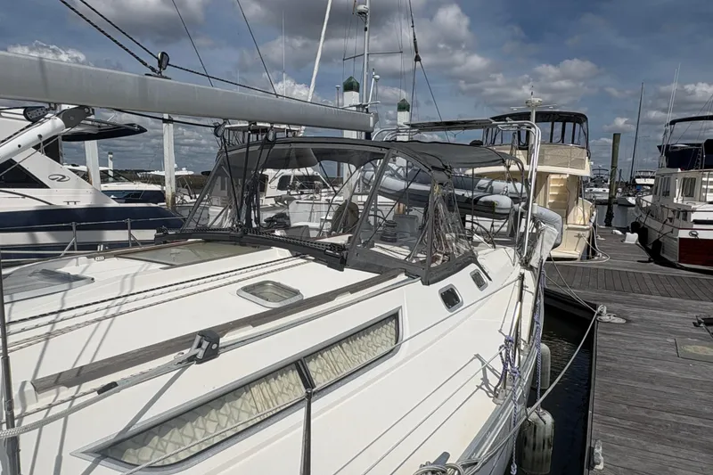 Slide: The Image of Jeanneau Sun Odyssey 45.2 sailboat docked at marina, 1998 model. - 11