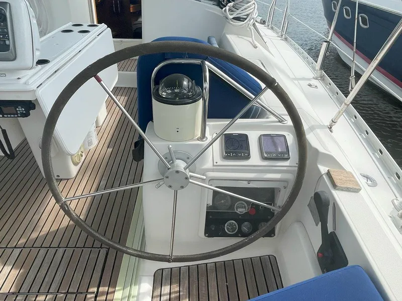 Slide: The Image of Steering wheel and controls of a 1998 Jeanneau Sun Odyssey 45.2 sailboat. - 20