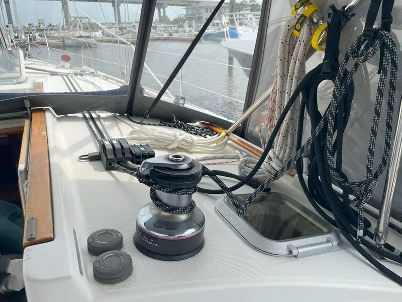 Slide: The Image of Deck of 1998 Jeanneau Sun Odyssey 45.2 sailboat with winch and ropes. - 22
