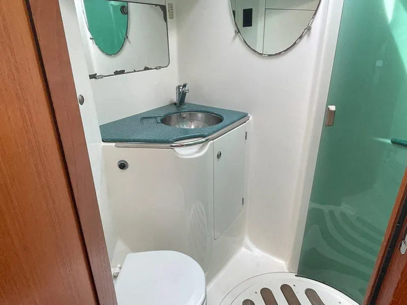 Slide: The Image of Bathroom interior of 1998 Jeanneau Sun Odyssey 45.2 yacht, featuring sink and toilet. - 36
