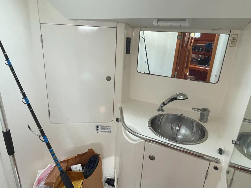 Slide: The Image of Interior of 1998 Jeanneau Sun Odyssey 45.2 yacht bathroom with sink and mirror. - 40