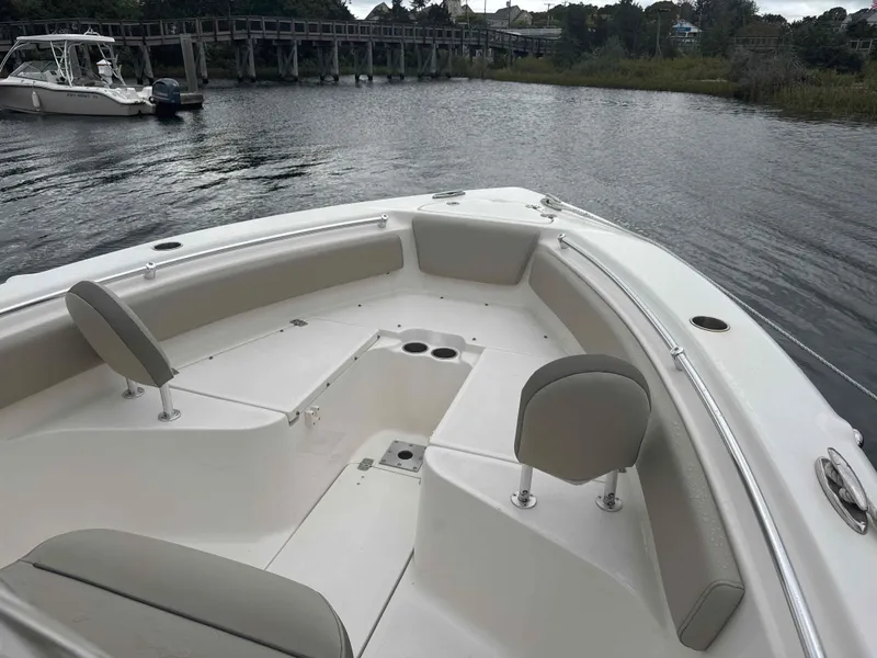 Slide: The Image of 2024 Key West 239 FS boat on calm water. - 2