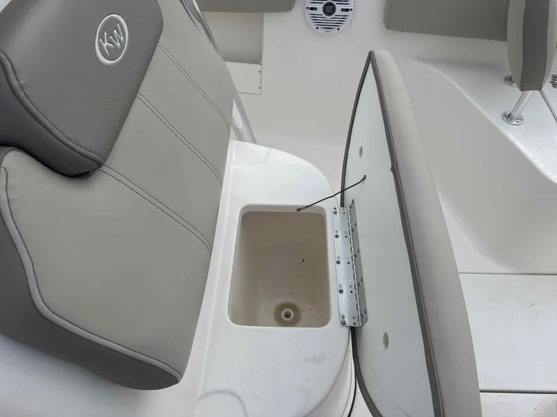 Slide: The Image of Key West 239 FS 2024 seat with storage compartment. - 3