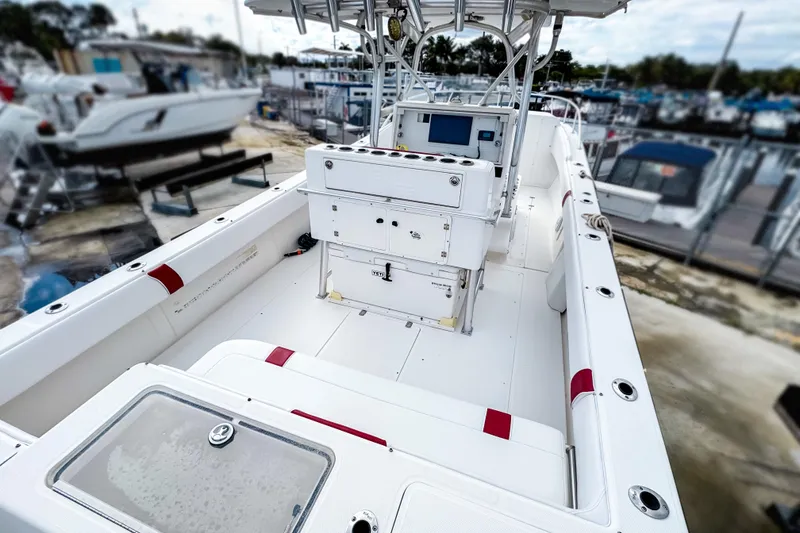 Slide: The Image of 2004 SeaVee 340i Cuddy boat interior with helm station and seating. - 1