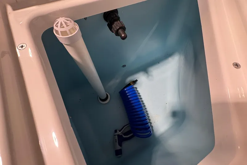 Slide: The Image of 2023 Yamaha Boats 222 FSH Sport dashboard with steering wheel and control panels. - 59