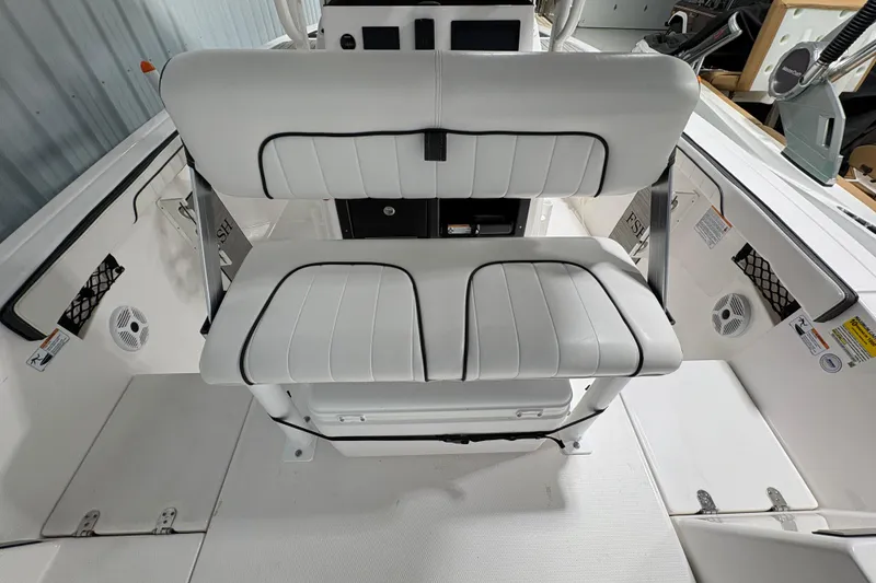 Slide: The Image of Jensen marine audio system on 2023 Yamaha Boats 222 FSH Sport, featuring Bluetooth connectivity. - 63