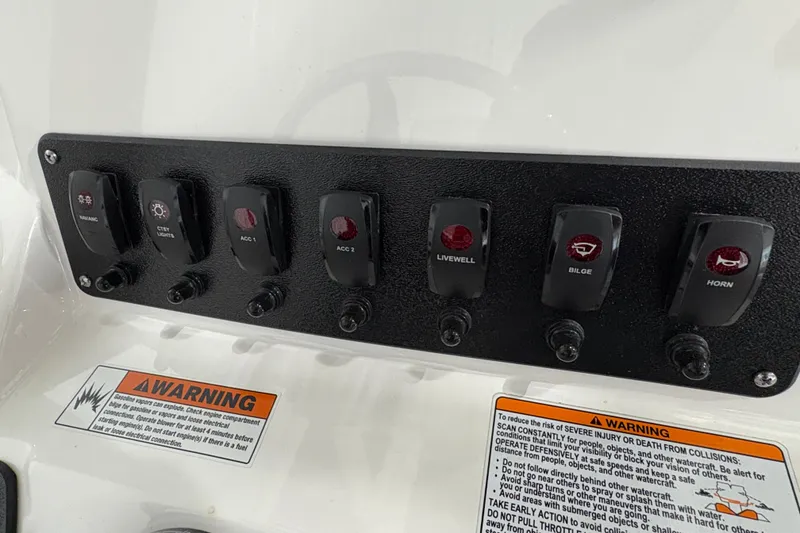 Slide: The Image of 2023 Yamaha Boats 222 FSH Sport storage compartment with gear and accessories. - 81