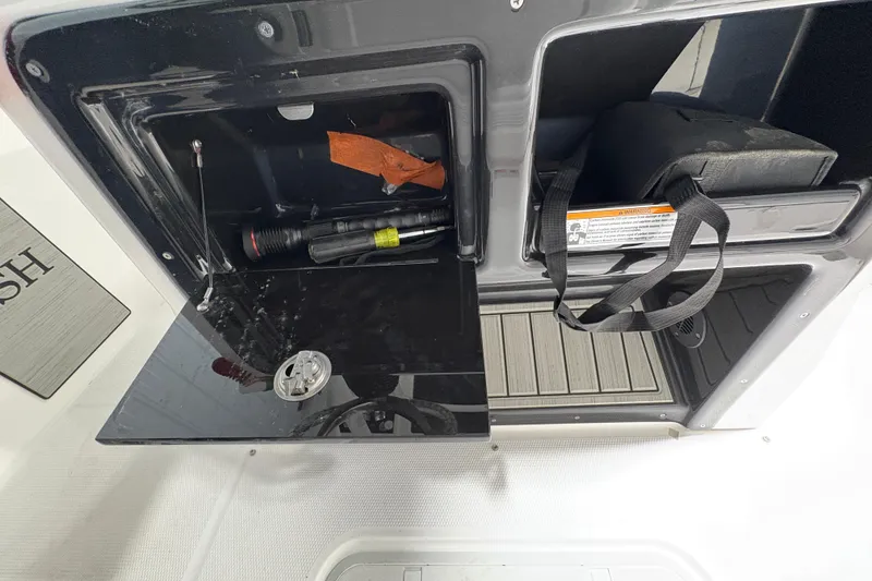 Slide: The Image of 2023 Yamaha Boats 222 FSH Sport interior, featuring sleek design and modern amenities. - 84