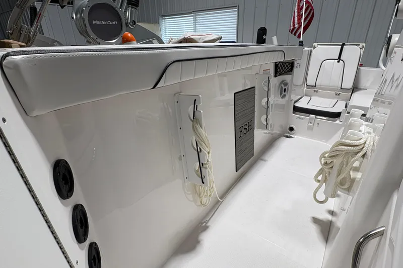 Slide: The Image of 2023 Yamaha Boats 222 FSH Sport engine compartment with high-output engines. - 96