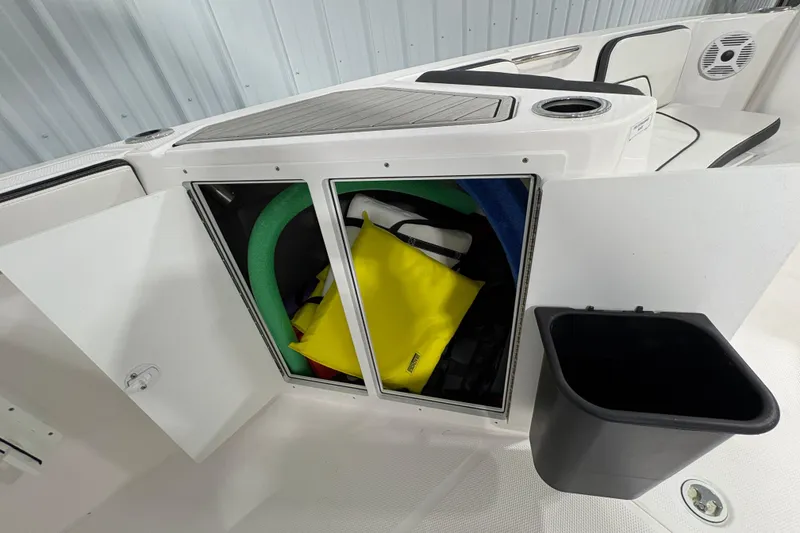 Slide: The Image of Engine compartment of 2023 Yamaha Boats 222 FSH Sport, featuring high-output engines. - 98