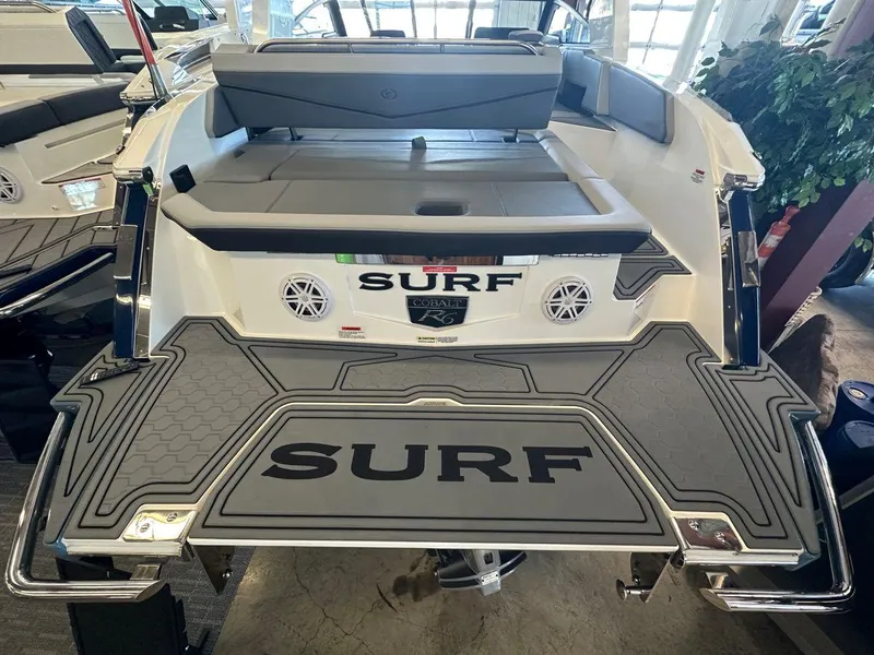 Slide: The Image of 2023 Cobalt R6 Surf boat rear view with Surf logo. - 12