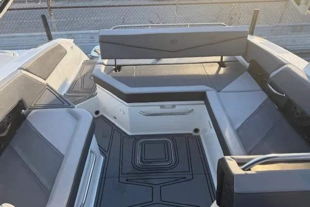 Slide: The Image of 2023 Cobalt R6 Surf boat interior with sleek seating and modern design. - 18