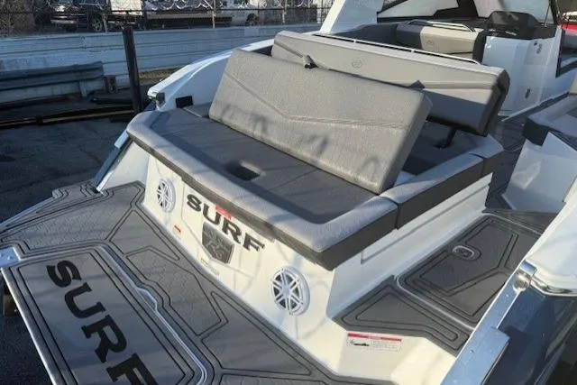 Slide: The Image of 2023 Cobalt R6 Surf boat with sleek seating and modern design features. - 23