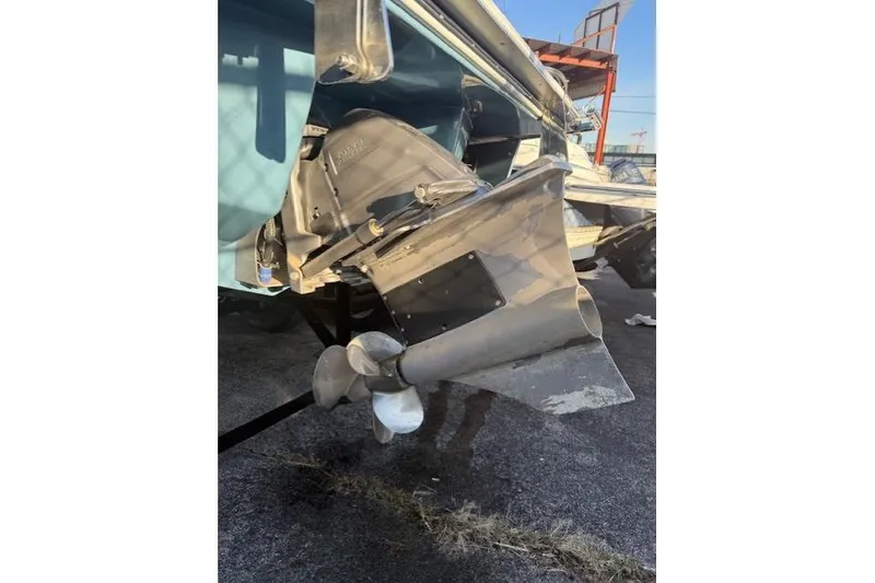 Slide: The Image of 2023 Cobalt R6 Surf boat propeller and stern drive detail. - 25