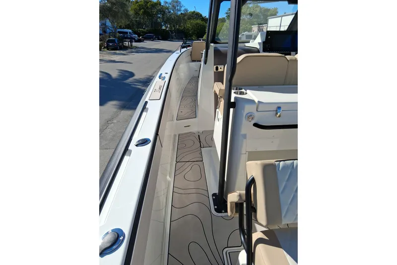 Slide: The Image of 2026 Zodiac X10CC boat interior with sleek design and modern seating. - 2