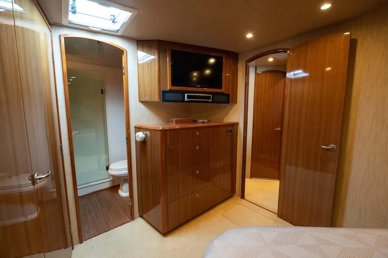 Slide: The Image of Luxurious interior of 2007 Viking 64 Convertible yacht with wood finishes and modern amenities. - 22