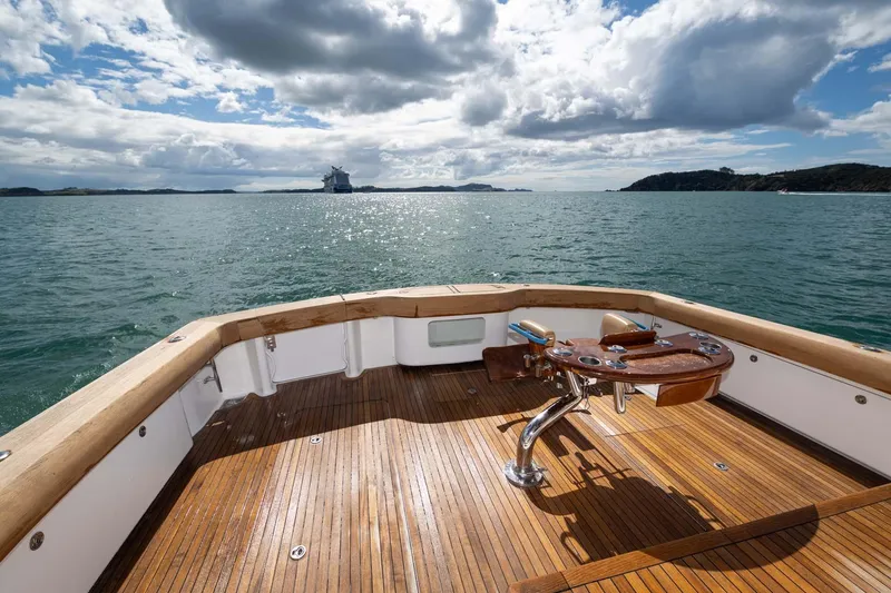 Slide: The Image of 2007 Viking 64 Convertible yacht deck with ocean view and fishing chair. - 31