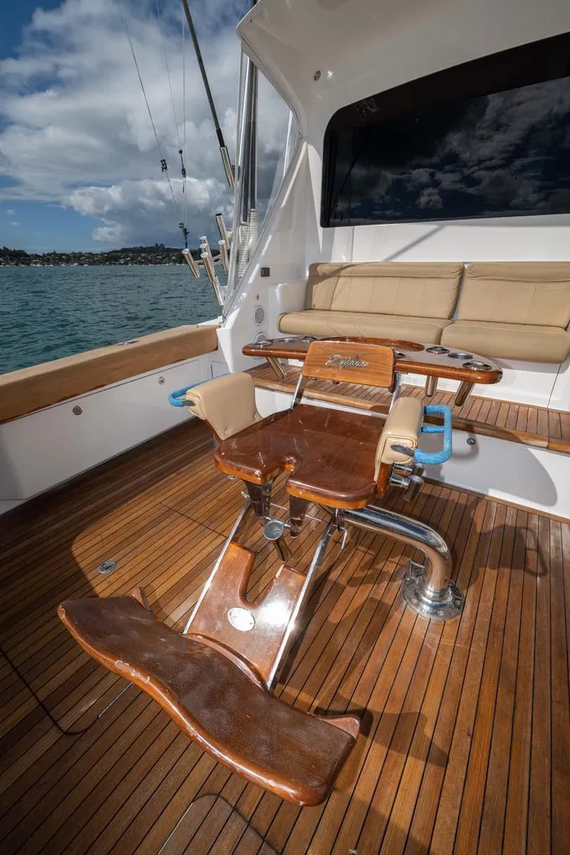 Slide: The Image of 2007 Viking 64 Convertible yacht deck with fishing chair and seating area. - 35