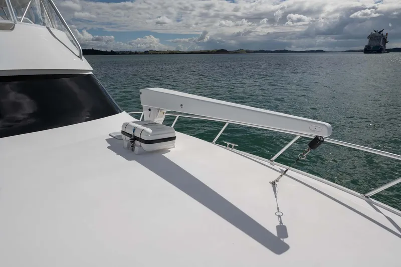 Slide: The Image of 2007 Viking 64 Convertible yacht deck with davit crane, ocean view. - 41