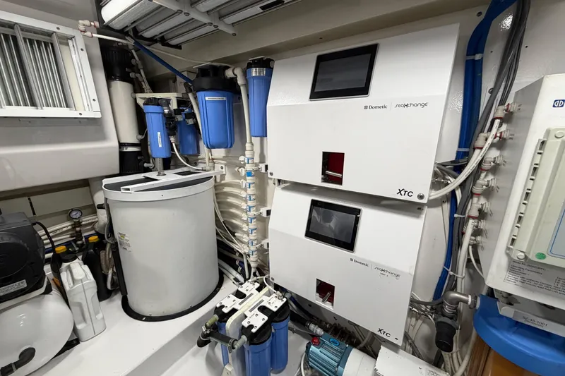 Slide: The Image of Engine room of 2007 Viking 64 Convertible yacht with advanced filtration systems. - 86