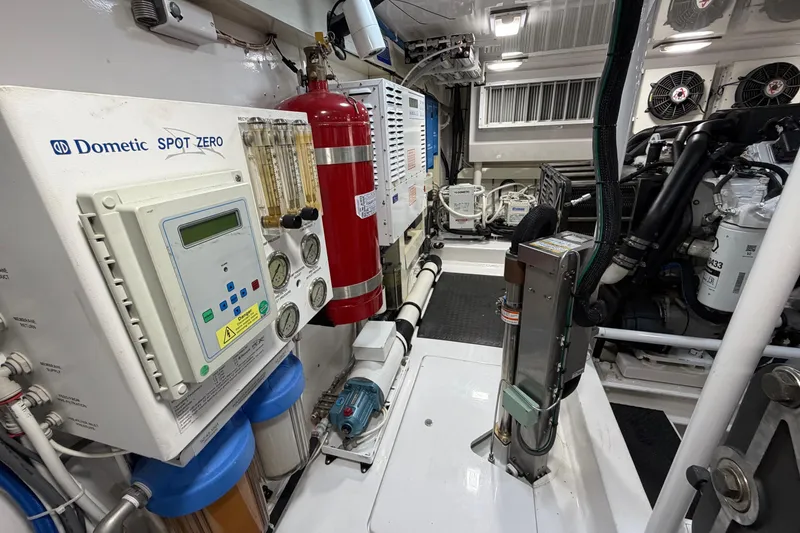 Slide: The Image of Engine room of a 2007 Viking 64 Convertible yacht with Dometic Spot Zero system. - 90