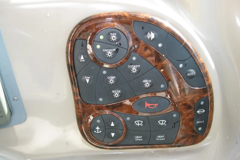 Slide: The Image of Control panel of a 2002 Sea Ray Sundancer 280 boat with wood finish. - 20