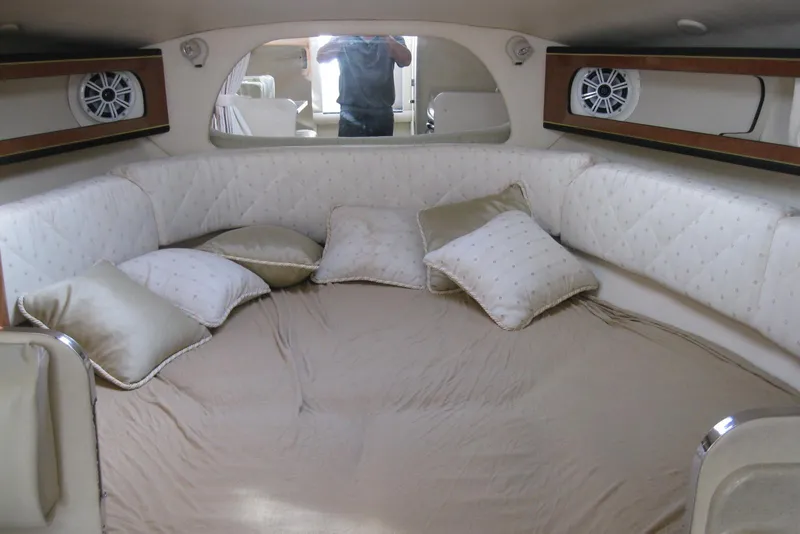 Slide: The Image of 2002 Sea Ray Sundancer 280 interior kitchenette with sink and compact fridge. - 34