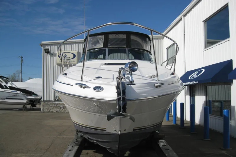 Slide: The Image of 2002 Sea Ray Sundancer 280 boat on trailer outside Anchor Marine Group building. - 4