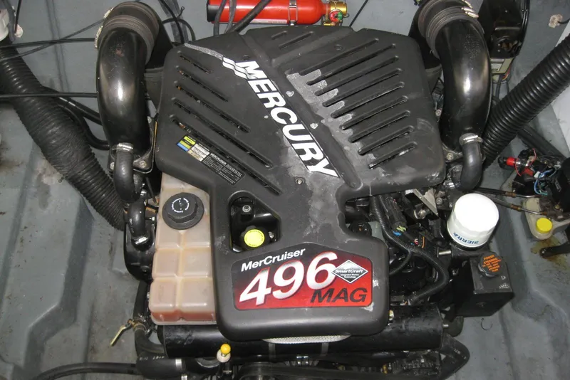 Slide: The Image of 2002 Sea Ray Sundancer 280 bathroom with sink, faucet, and porthole window. - 40