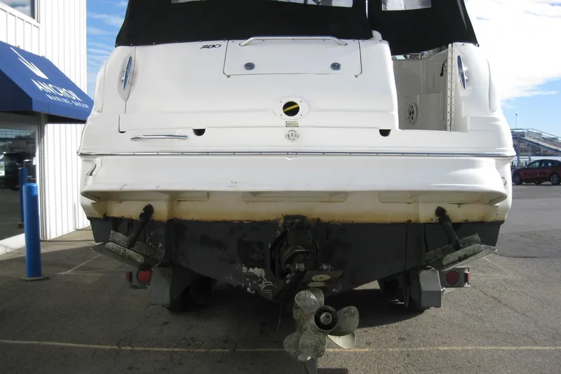 Slide: The Image of 2002 Sea Ray Sundancer 280 boat rear view with swim platform. - 8