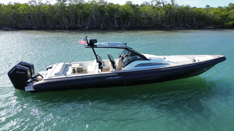 The Image of Technohull 47 Omega 2023 on calm water, side view. - 0